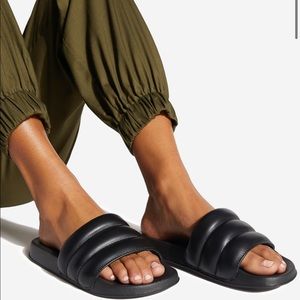 Flat black sandals